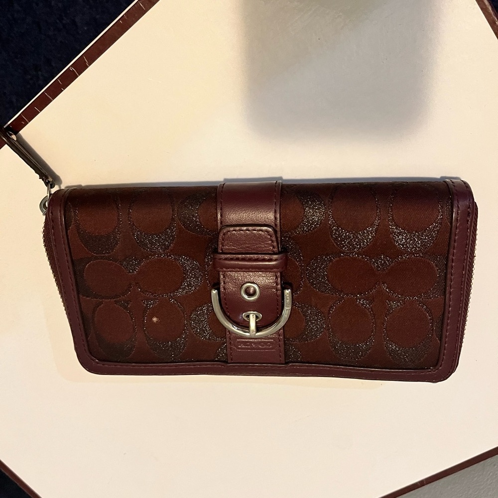 Burgundy signature Coach wallet